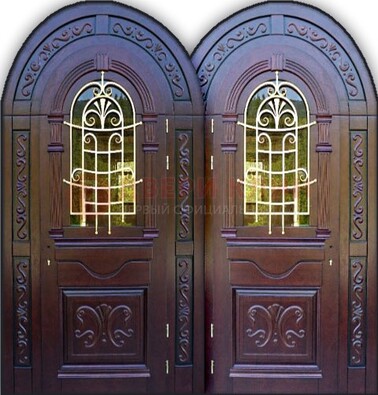 Индивидуальная арочная дверь со стеклом и ковкой ДА-19 в Сосновый Бор