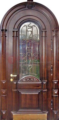 Арочная металлическая дверь массив со стеклом и ковкой ДА-50 в Сосновый Бор