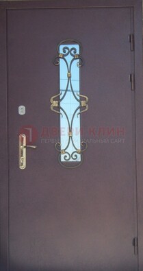 Металлическая дверь со стеклом и ковкой ДСК-77 в Сосновый Бор